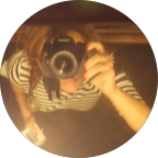 Professional headshot of Jennifer L. with blonde hair smiling